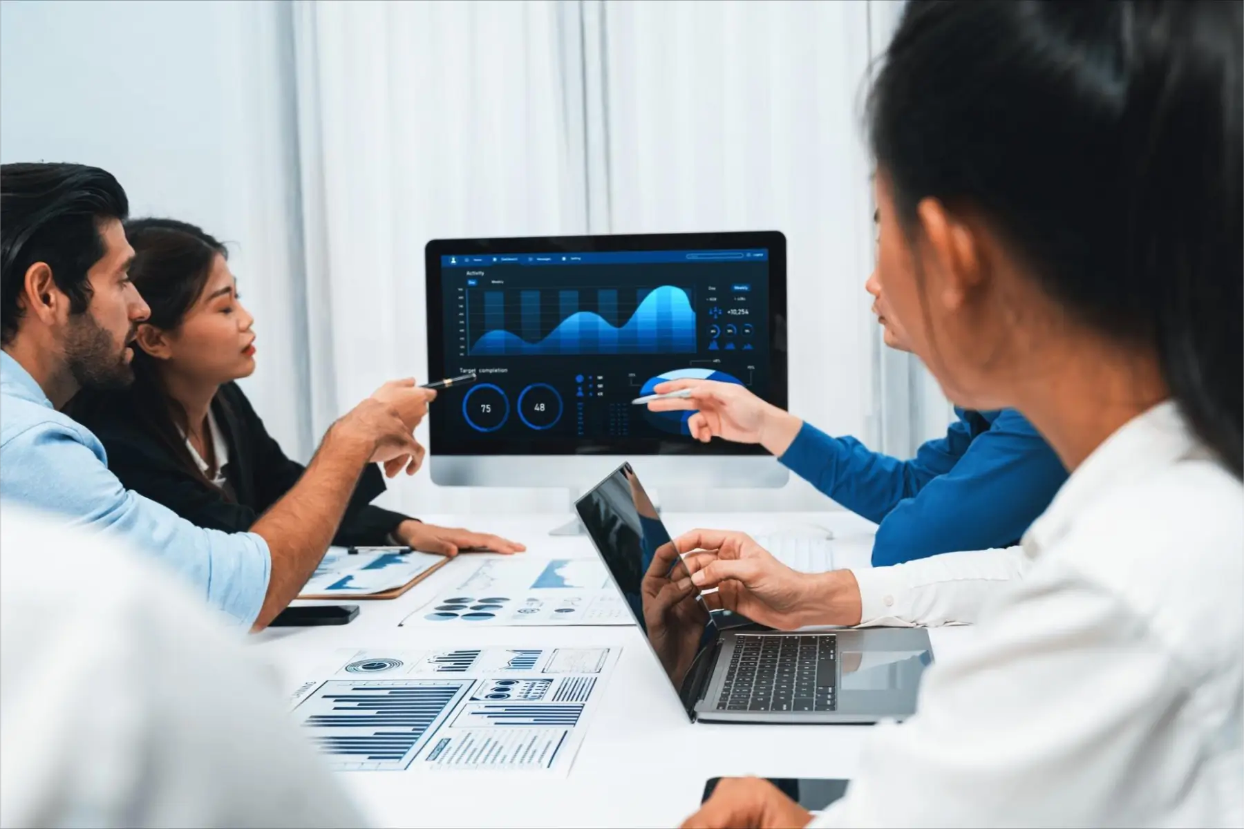 data-analytics-consulting young joyful business people working