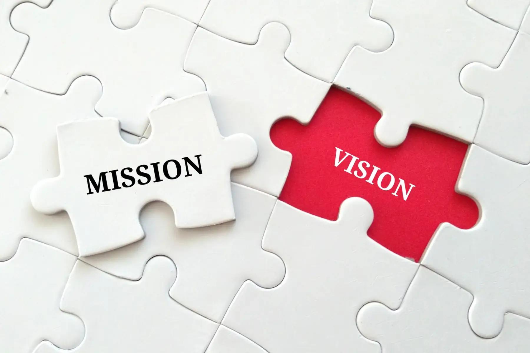 mission puzzle pieces with one missing piece, which has mission written on it